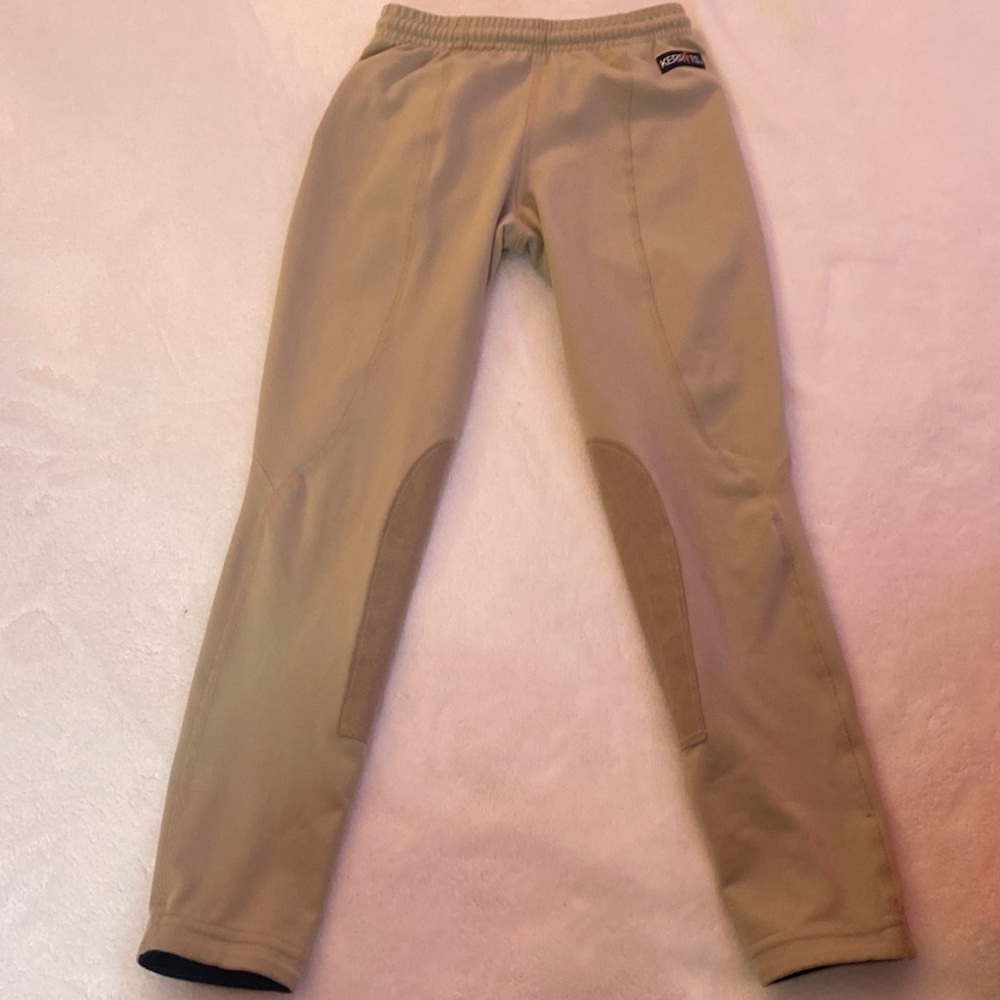 Tan summer weight riding breeches.